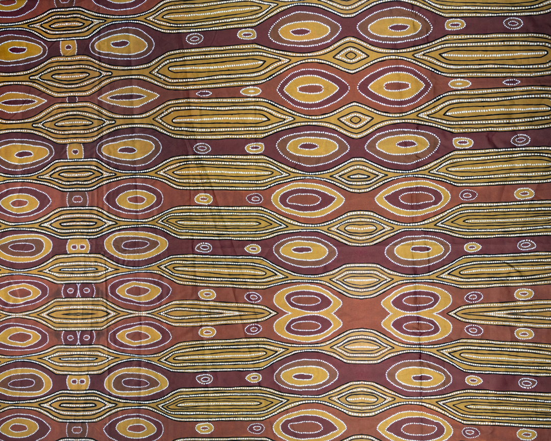 Printed cotton sheet showing oval shapes representing woody pears in brown colours.