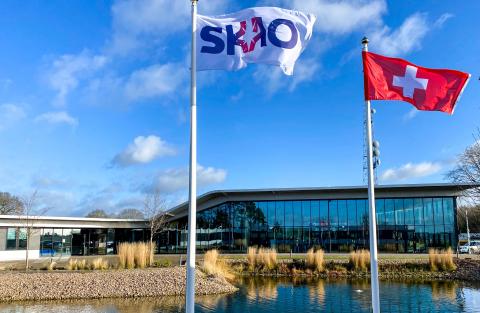 SKAO and Swiss flags in front to SKAO HQ Building