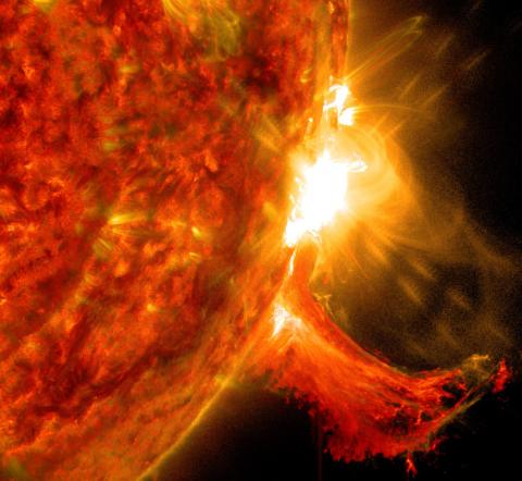 A solar flare bursting out from the Sun