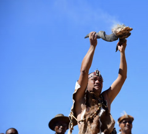 An Indigenous leader conducts a ceremonial blessing and cleansing of the SKA project and South African SKA site.