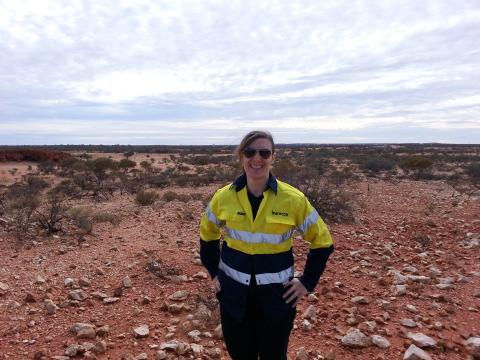 Rebecca Wheadon in the outback of Western Australia wearing a hi-vis shirt
