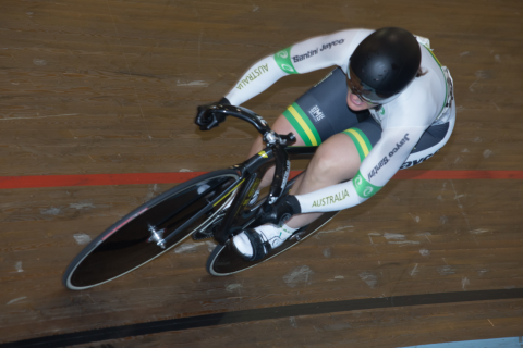 Rebecca Wheadon on a racing bike on the track