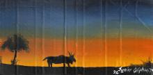 Painting of a landscape with a tree and an eland during a sunrise. 