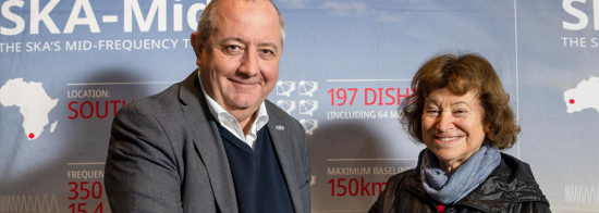 Picture of Filippo Zerbi and Catherine Cesarsky in front of SKAO banner.