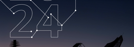Front cover of the SKAO's 2024 annual report. The image is of several SKA-Low antennas and an SKA-Mid antenna silhouetted against a dawn sky. 