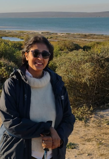 Sharmila Goedhart walking by the sea